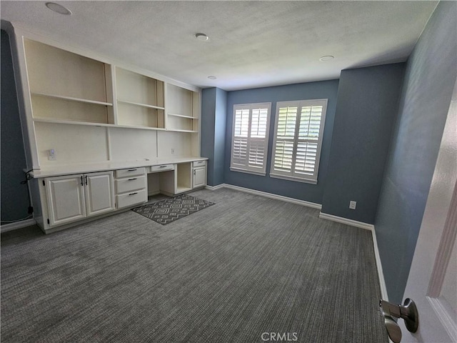 41710 Crispi Ln, Lancaster, CA 93536 - unfurnished office with built in desk and dark colored carpet