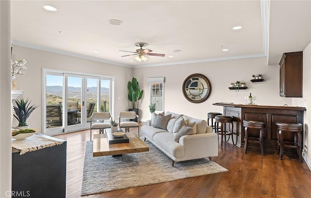 870 Avenida Acapulco, San Clemente, CA 92672 - living room featuring a ceiling fan, wood finished floors, recessed lighting, crown molding, and a mountain view