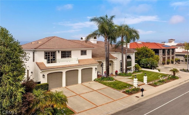 870 Avenida Acapulco, San Clemente, CA 92672 - mediterranean / spanish-style house featuring a tiled roof, driveway, stucco siding, and an attached garage
