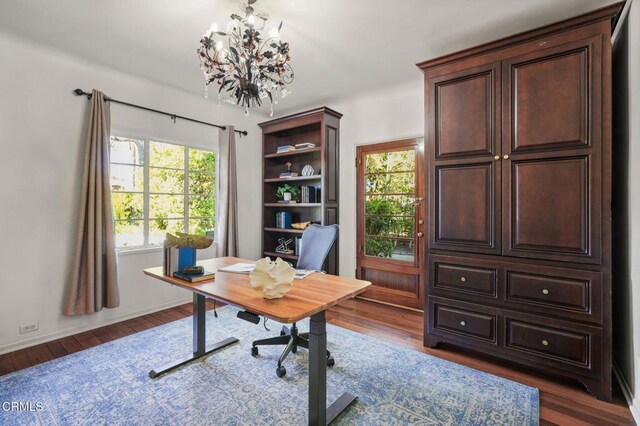 980 El Campo Dr, Pasadena, CA 91107 - home office with healthy amount of natural light, wood finished floors, and a chandelier