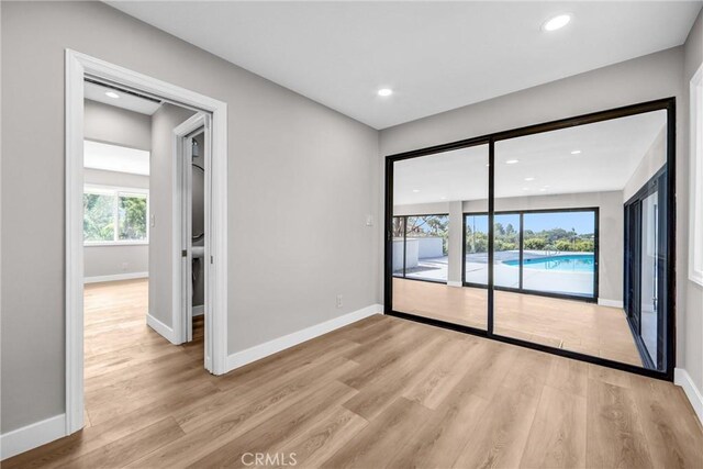 247 El Cielo Ln, Bradbury, CA 91008 - spare room featuring light wood-style floors and recessed lighting
