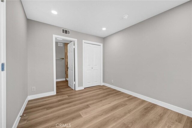 247 El Cielo Ln, Bradbury, CA 91008 - unfurnished bedroom with wood finished floors, a closet, and recessed lighting