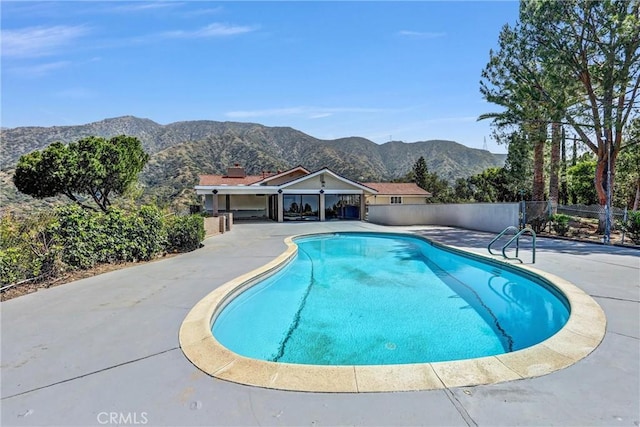 247 El Cielo Ln, Bradbury, CA 91008 - view of swimming pool with a mountain view and a patio area