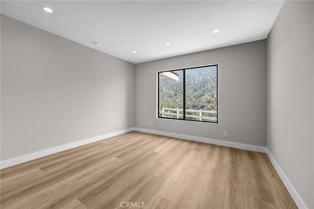 247 El Cielo Ln, Bradbury, CA 91008 - spare room featuring light wood-style floors and recessed lighting
