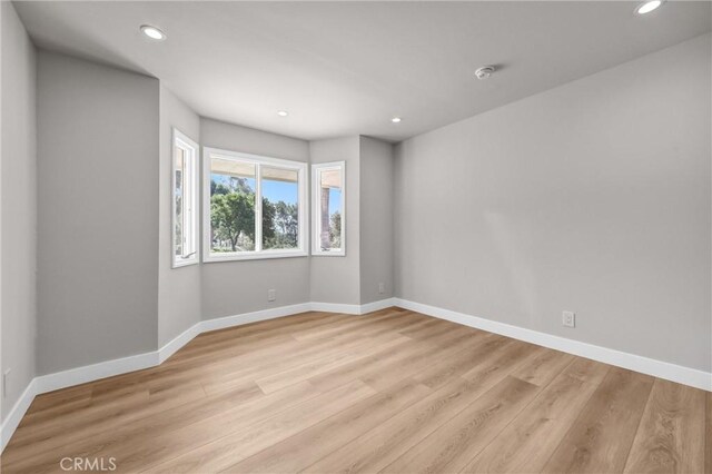 247 El Cielo Ln, Bradbury, CA 91008 - unfurnished room featuring recessed lighting, light wood-style floors, and a smoke detector