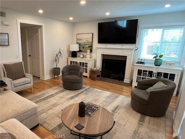 11171 Baylor St, Rancho Cucamonga, CA 91701 - living area featuring wood finished floors, recessed lighting, and a fireplace