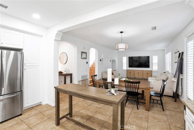8338 Edgewood St, Chino, CA 91708 - living area with arched walkways, light tile patterned floors, and recessed lighting