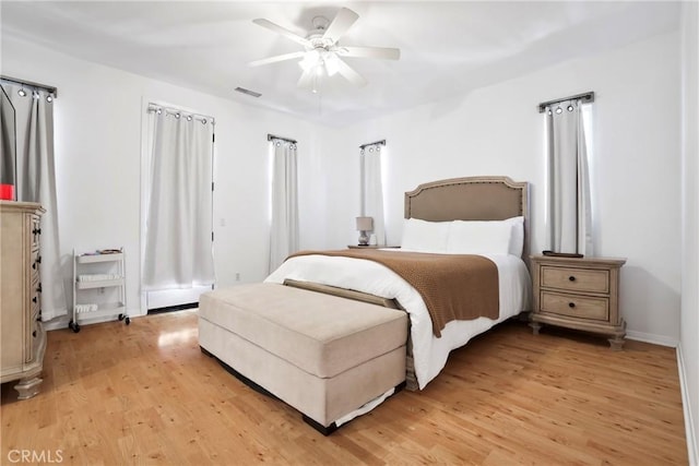 8338 Edgewood St, Chino, CA 91708 - bedroom featuring light wood finished floors and a ceiling fan
