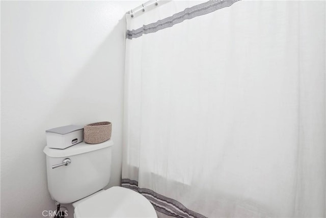 8338 Edgewood St, Chino, CA 91708 - bathroom with toilet and curtained shower