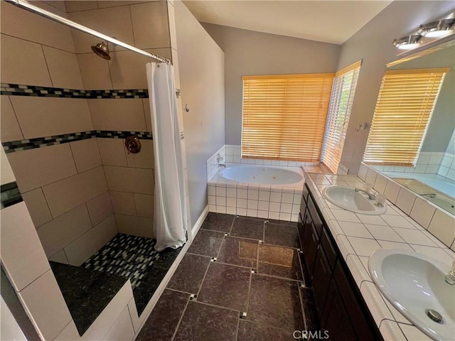 18725 Dallas Ave, Riverside, CA 92508 - full bath with lofted ceiling, a garden tub, a tile shower, and double vanity