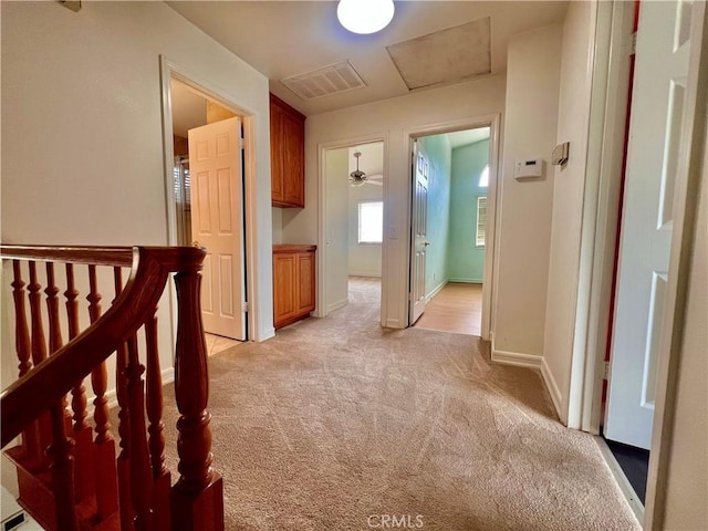 18725 Dallas Ave, Riverside, CA 92508 - hallway with light colored carpet and baseboards