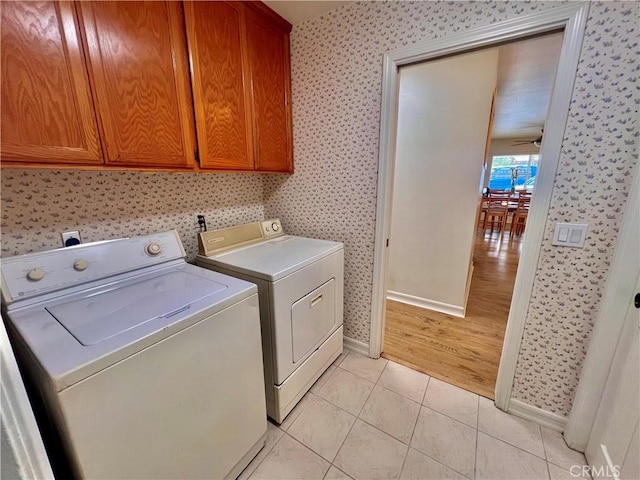 18725 Dallas Ave, Riverside, CA 92508 - laundry area featuring separate washer and dryer, wallpapered walls, cabinet space, light tile patterned flooring, and ceiling fan