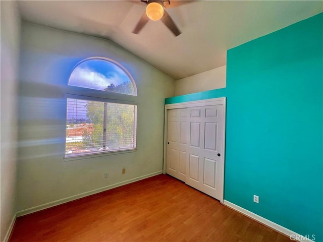18725 Dallas Ave, Riverside, CA 92508 - unfurnished bedroom with vaulted ceiling, wood finished floors, a ceiling fan, and a closet