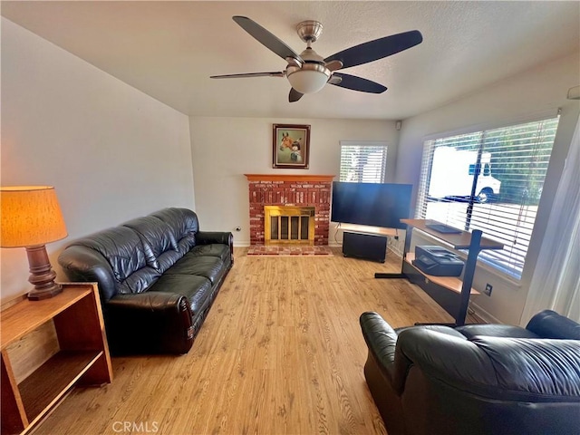 18725 Dallas Ave, Riverside, CA 92508 - living area with wood finished floors, ceiling fan, and a fireplace