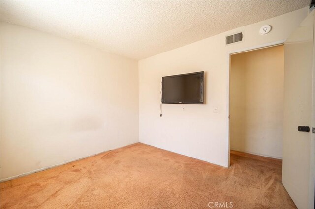 3 Bonanza Ct, Pomona, CA 91766 - carpeted spare room with a textured ceiling