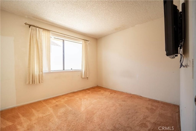 3 Bonanza Ct, Pomona, CA 91766 - empty room featuring light carpet and a textured ceiling