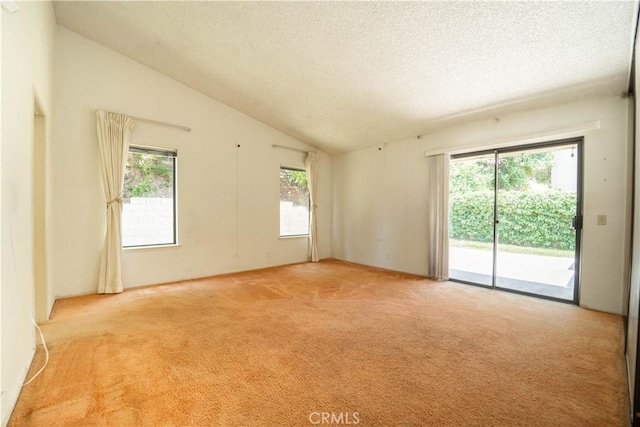 3 Bonanza Ct, Pomona, CA 91766 - empty room featuring light carpet, a textured ceiling, and lofted ceiling