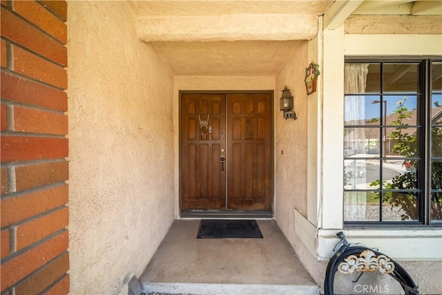 3 Bonanza Ct, Pomona, CA 91766 - property entrance with stucco siding