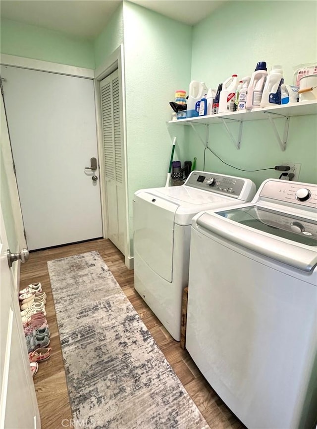2404 W Oak Ave, Fullerton, CA 92833 - laundry area featuring washer and dryer and wood finished floors