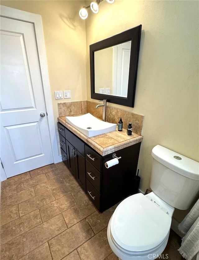 2404 W Oak Ave, Fullerton, CA 92833 - bathroom with vanity and stone finish floors