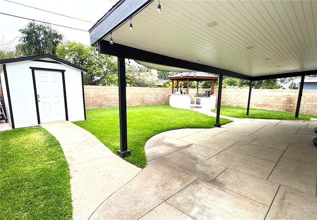 2404 W Oak Ave, Fullerton, CA 92833 - fenced backyard featuring a gazebo, a patio, a shed, and washer and dryer