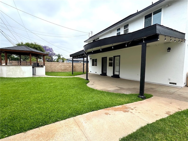 2404 W Oak Ave, Fullerton, CA 92833 - back of house featuring a gazebo, a patio area, and stucco siding