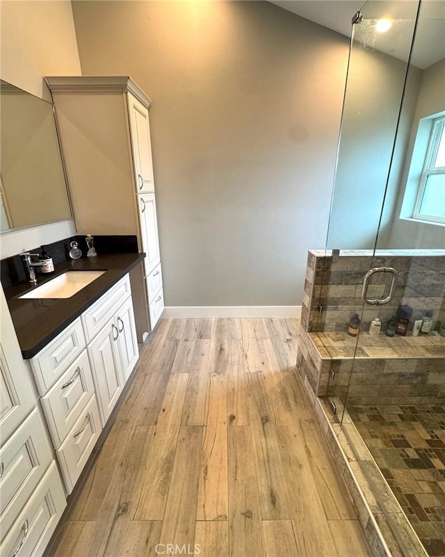 2404 W Oak Ave, Fullerton, CA 92833 - full bath with hardwood / wood-style floors, vanity, and a shower stall