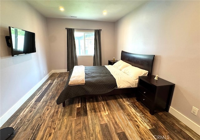 2404 W Oak Ave, Fullerton, CA 92833 - bedroom featuring dark wood-type flooring and baseboards
