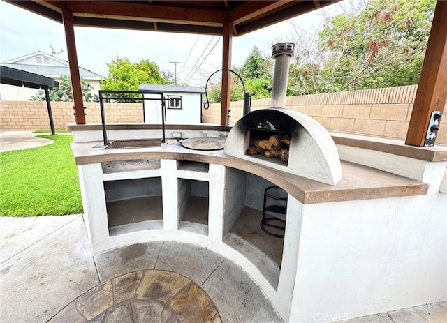 2404 W Oak Ave, Fullerton, CA 92833 - fenced backyard with a patio area