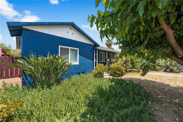 1323 W 6th St, Pomona, CA 91766 - view of side of property featuring stucco siding