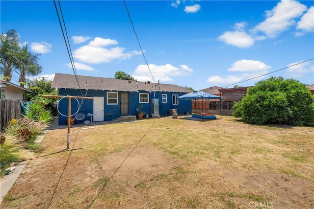 1323 W 6th St, Pomona, CA 91766 - back of property with stucco siding