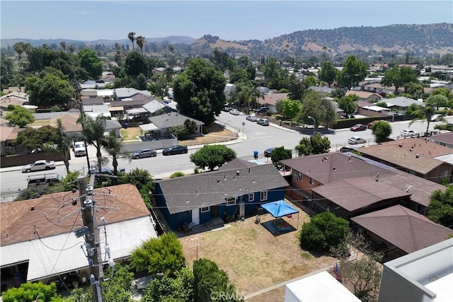 1323 W 6th St, Pomona, CA 91766 - aerial perspective of suburban area featuring a mountain backdrop