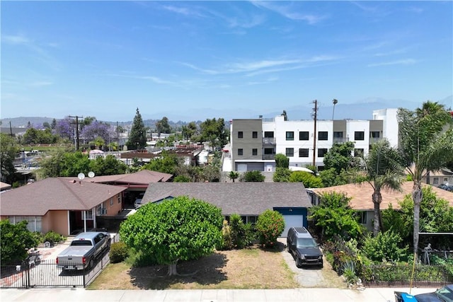 1323 W 6th St, Pomona, CA 91766 - view of building exterior featuring a residential view and a garage