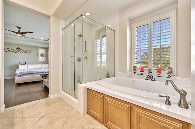 524 S Petunia St, La Habra, CA 90631 - full bath with ensuite bath, a shower stall, a bath, plenty of natural light, and recessed lighting