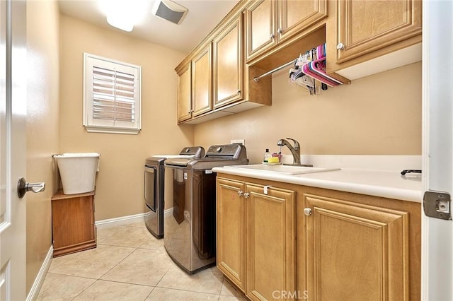 524 S Petunia St, La Habra, CA 90631 - laundry room featuring independent washer and dryer, cabinet space, and light tile patterned flooring