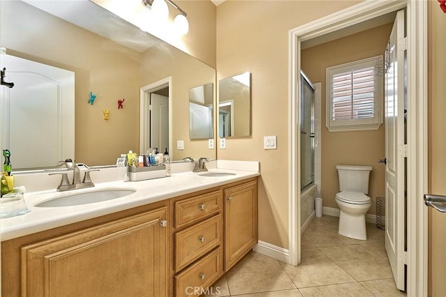 524 S Petunia St, La Habra, CA 90631 - bathroom with double vanity, tile patterned flooring, and combined bath / shower with glass door