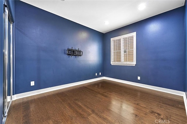 524 S Petunia St, La Habra, CA 90631 - empty room featuring wood finished floors and baseboards