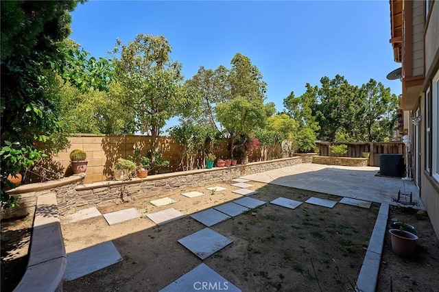524 S Petunia St, La Habra, CA 90631 - fenced backyard with a patio area