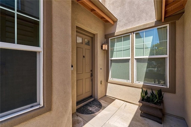 524 S Petunia St, La Habra, CA 90631 - doorway to property with stucco siding