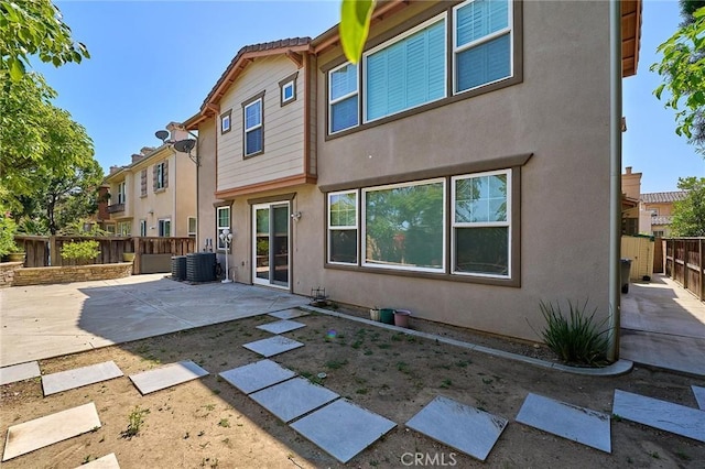 524 S Petunia St, La Habra, CA 90631 - rear view of property with a patio, a fenced backyard, and stucco siding