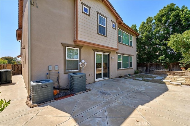 524 S Petunia St, La Habra, CA 90631 - back of property with a fenced backyard, a patio, and stucco siding