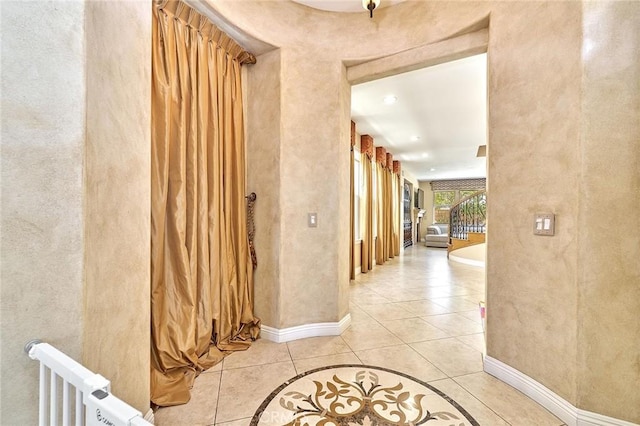 524 S Petunia St, La Habra, CA 90631 - hall with light tile patterned flooring and a textured wall