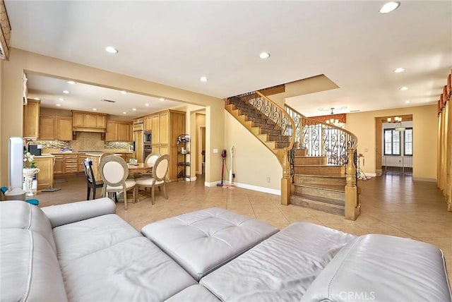 524 S Petunia St, La Habra, CA 90631 - living room with light tile patterned floors, recessed lighting, stairway, and a chandelier