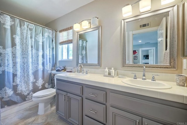 1709 Blackbird Cir, Carlsbad, CA 92011 - full bath with double vanity and a shower with shower curtain