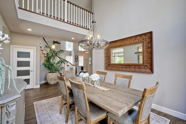 1709 Blackbird Cir, Carlsbad, CA 92011 - dining room with plenty of natural light, dark wood-style floors, recessed lighting, a chandelier, and a high ceiling