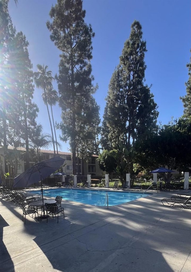 10737 San Diego Mission Rd Unit 111, San Diego, CA 92108 - community pool featuring a patio area
