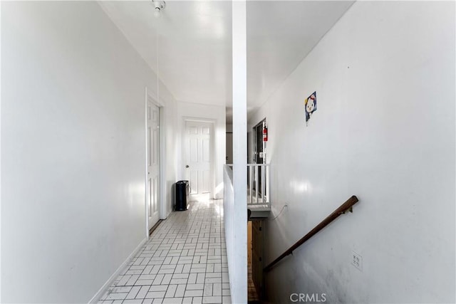 2005 Magnolia Ave, Los Angeles, CA 90007 - hallway with an upstairs landing and brick patterned flooring