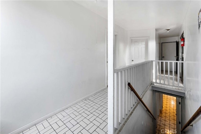 2005 Magnolia Ave, Los Angeles, CA 90007 - corridor with an upstairs landing and brick patterned floors