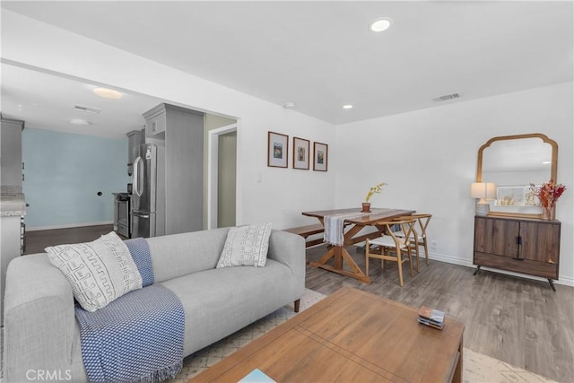 74417 Maricopa Dr Unit 29, Palms, CA 92277 - living area with wood finished floors and recessed lighting