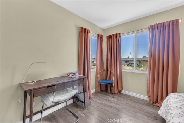 74417 Maricopa Dr Unit 29, Palms, CA 92277 - bedroom with baseboards and wood finished floors